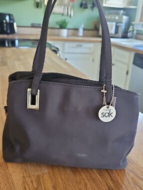 The Sak Dark Brown Shoulder Tote with Logo Charm